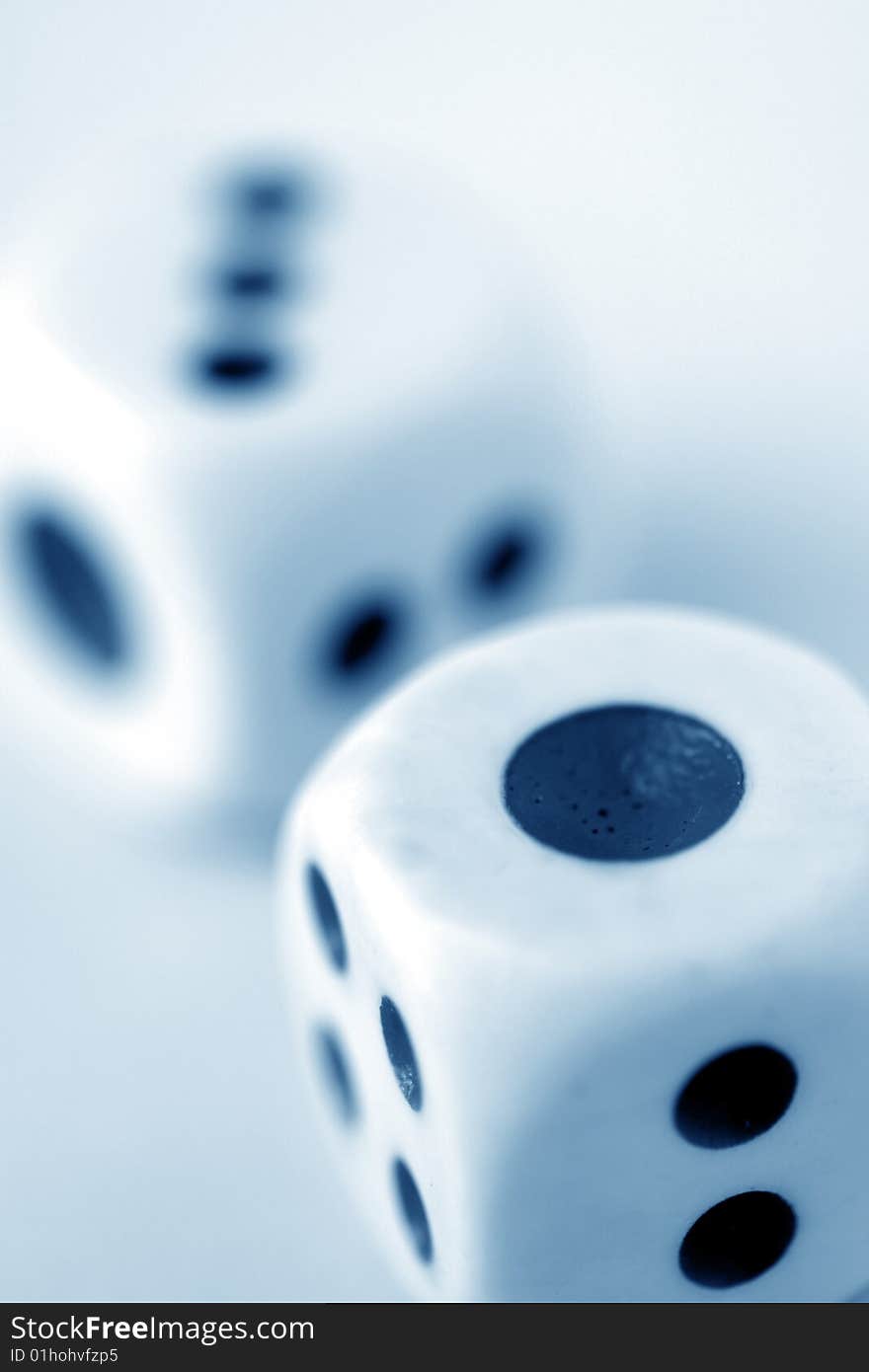 Square dice on color background