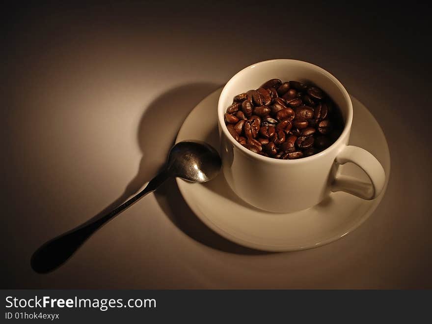 Cup of Fragrant Roasted Coffee Beans