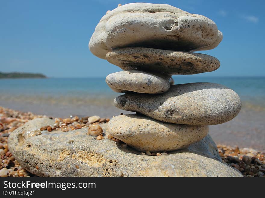 Balanced stones on beach