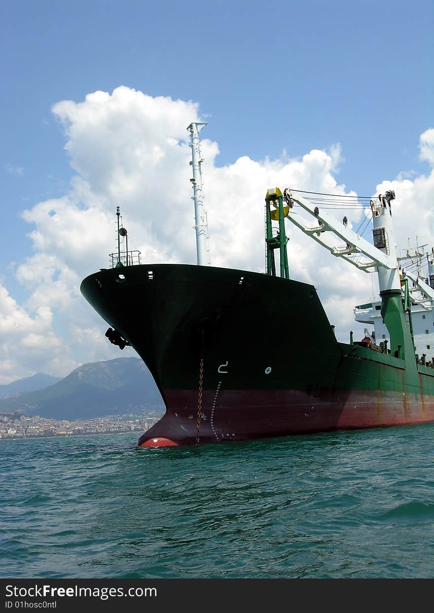 Cargo boat anchored in the middle of the sea near salerno