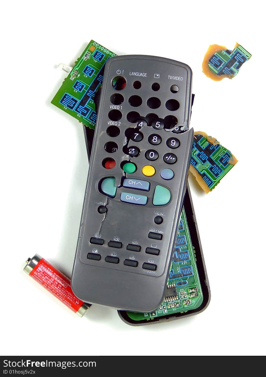 A television remote control that has smashed and broken - isolated over pure white. A television remote control that has smashed and broken - isolated over pure white.
