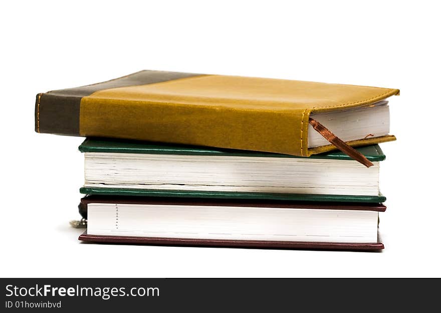 Notebooks with book-mark isolated on white background