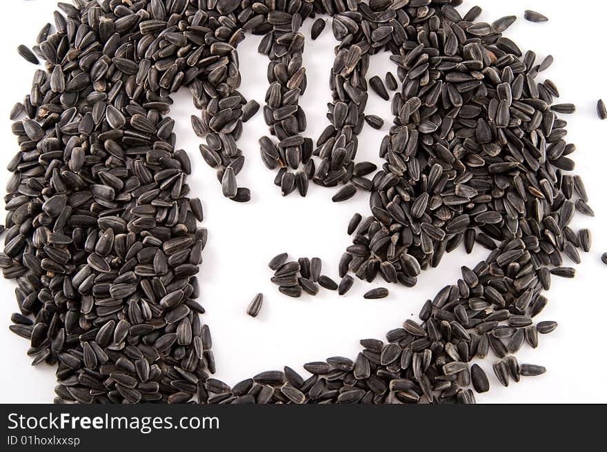 Overprint of hand from sunflower seeds