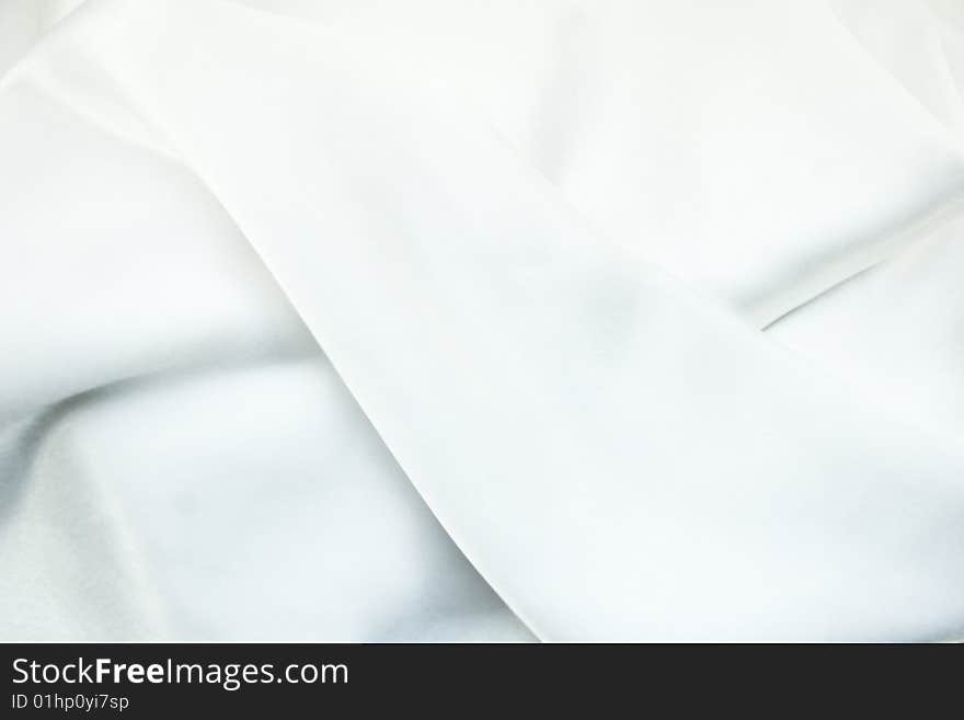 Texture of a white silk close up