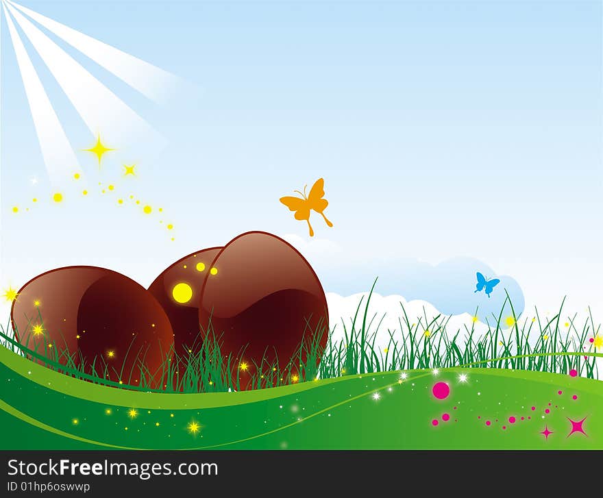 Green lawn with easter chocolate eggs and nature in bloom