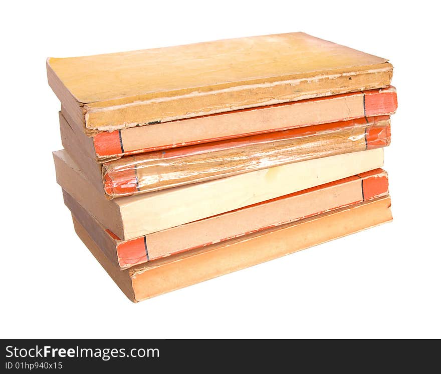 Old paperback books isolated against a white background