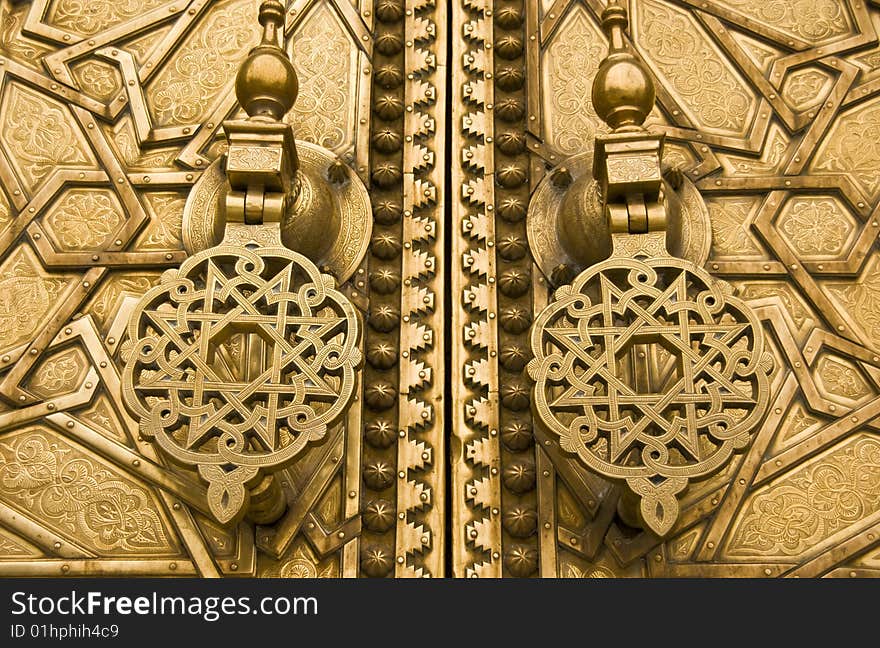 Old bronze door handles of the imperial palace of fez