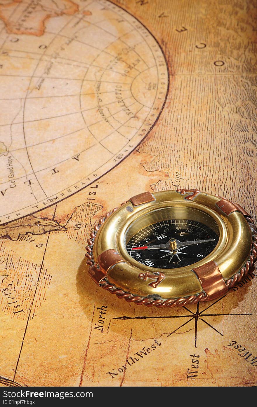 Old-fashioned Compass On A Background