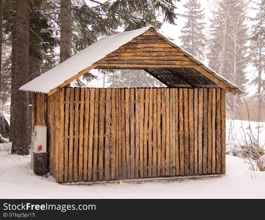 Wooden cabin in winter scenery