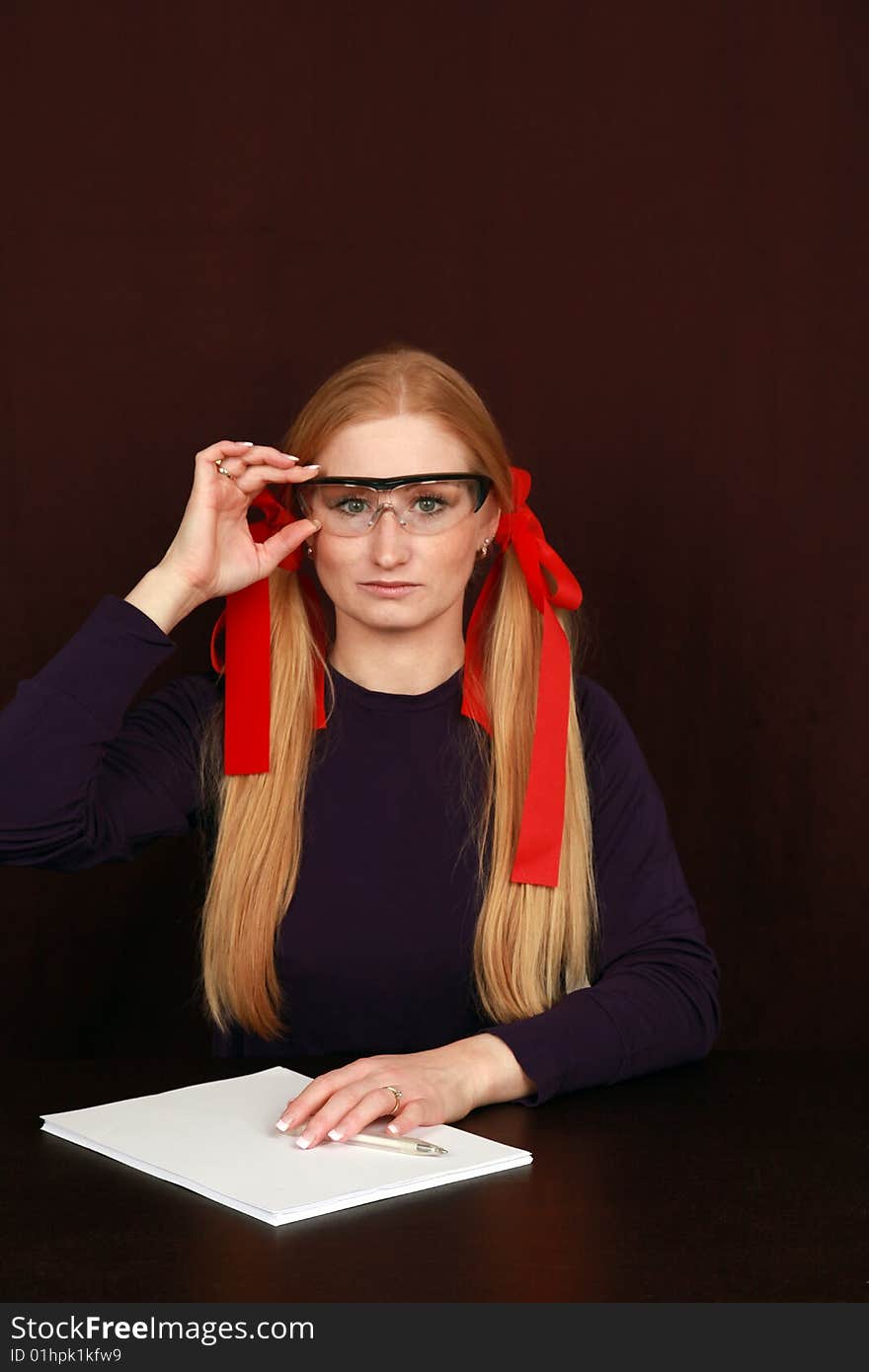 Metaphoric business portrait of woman with glasses with contract. Metaphoric business portrait of woman with glasses with contract