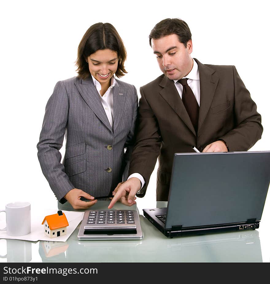 Two friendly business partners working on a laptop computer