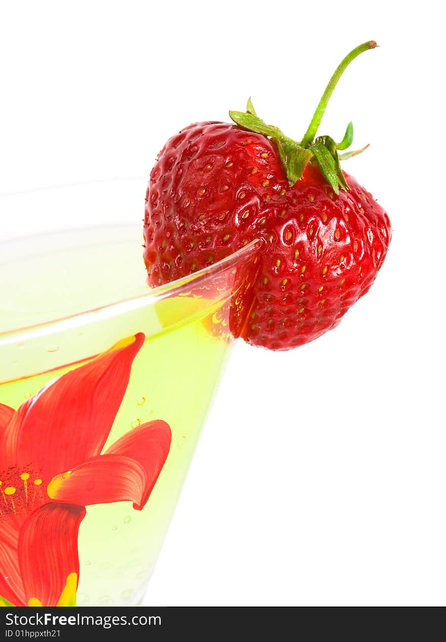 Strawberry with glass of cocktail isolated