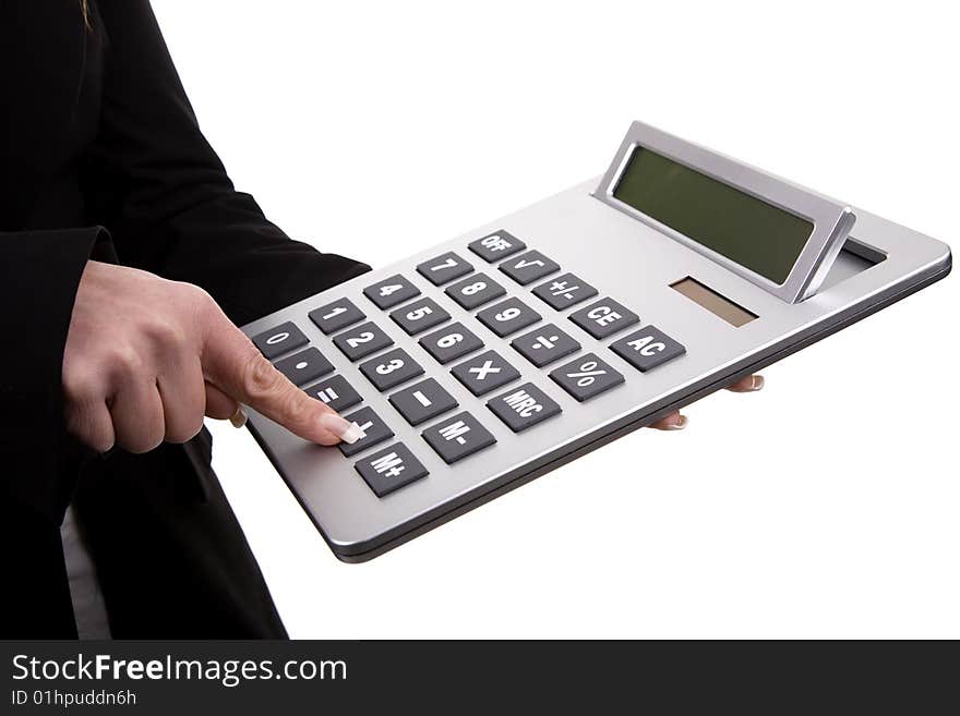 Businesswoman fingers touching calculator buttons