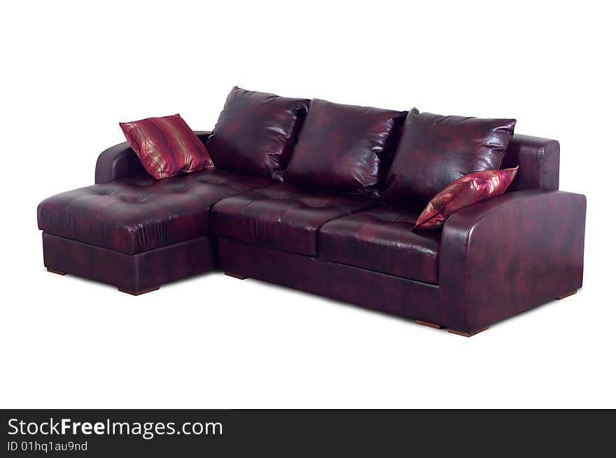 Purple leather sofa with pillows