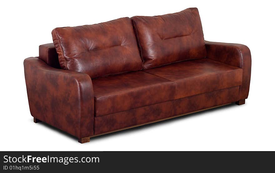 A Small Leather Sofa With Pillow