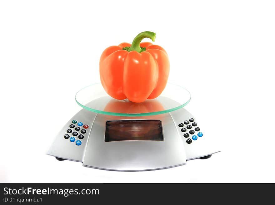 Red pepper on glass scales