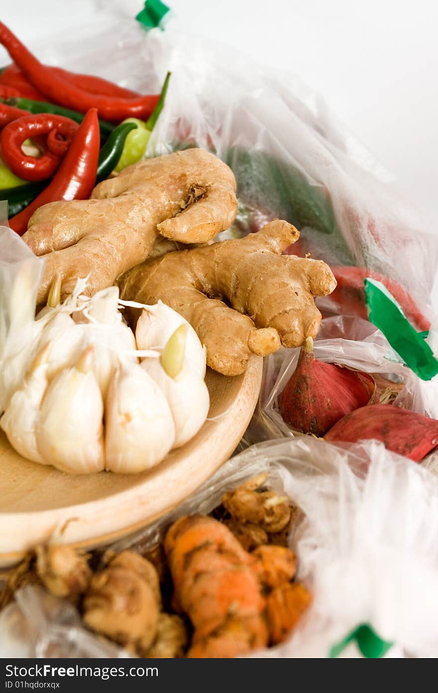 Variety of seasoning ingredients on white background