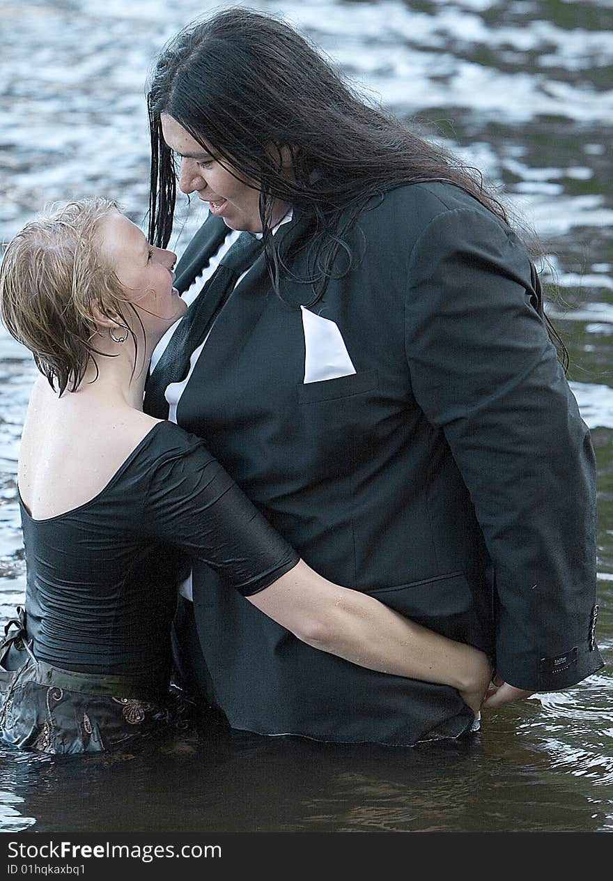 Couple in water in a lake in sweden