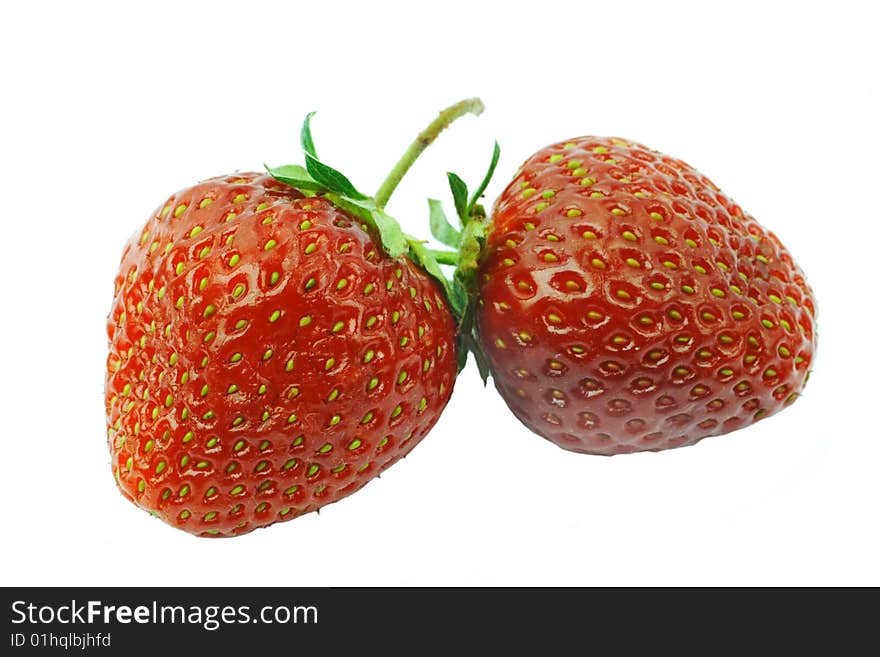 Two strawberries on white background