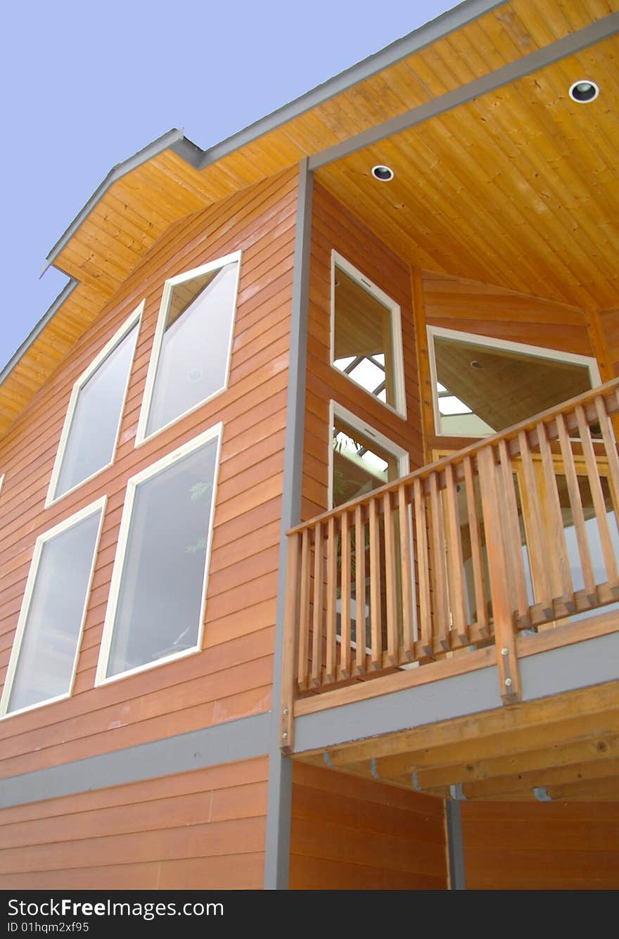 Low angle view of the front of a custom built home.