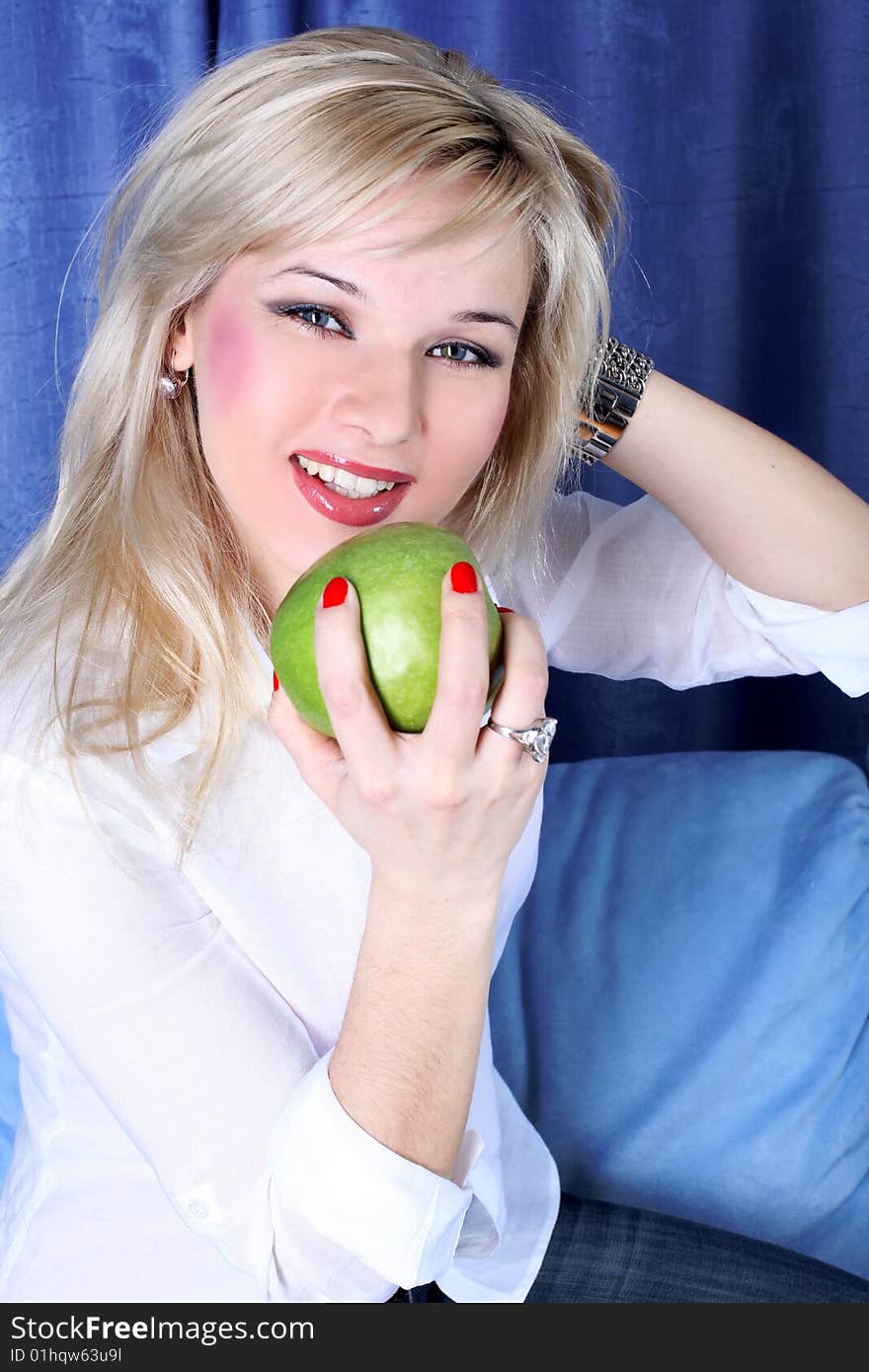 Girl with apple in room