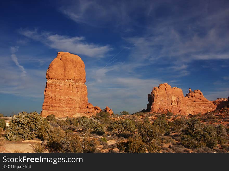 View of the red rock formations in Arches National Park with blue sky�s and clouds