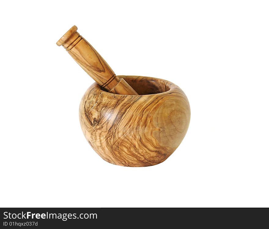 Wooden mortar with a pestle on a white background