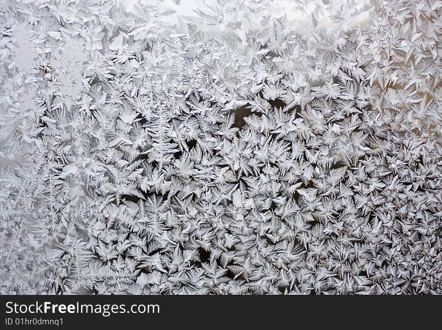 Winter frostwork on window glass