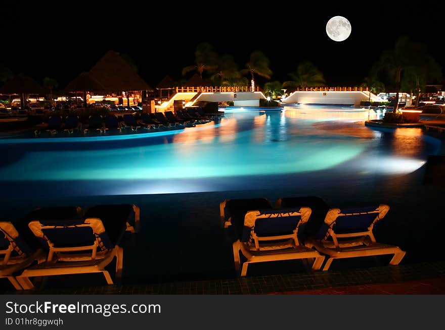 A luxury all inclusive beach resort at night in Cancun Mexico