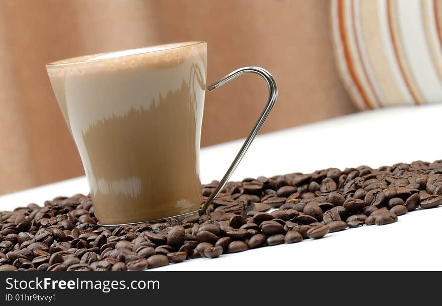 Cappuccino And Roasted Coffee Beans