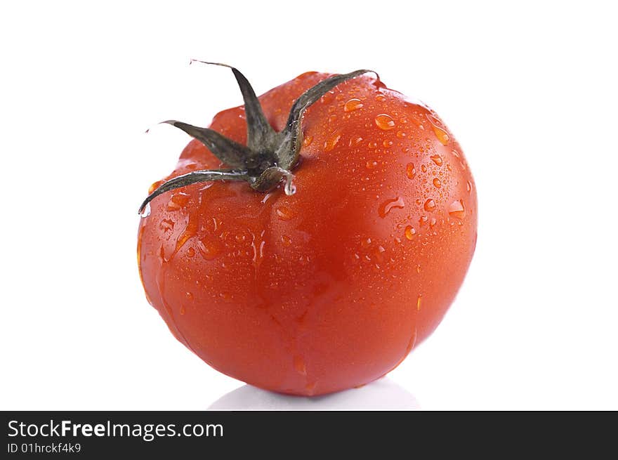 Tomato with water drops isolated on white.. Very high detail texture.