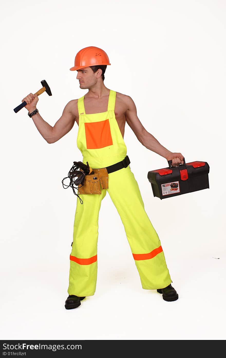 Young handsome electrician . Over white background