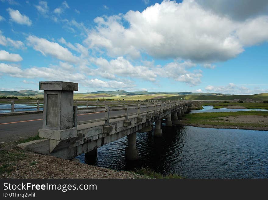 Bridges under the blue sky and white clouds