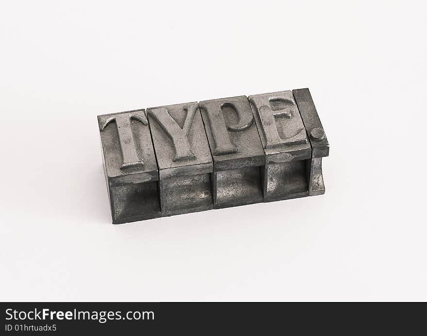 Isolated shot of metal typographic letters forming the word type.