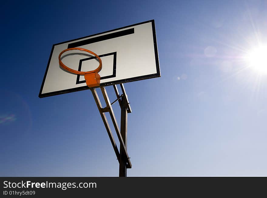 Up view of a basketball hoop.