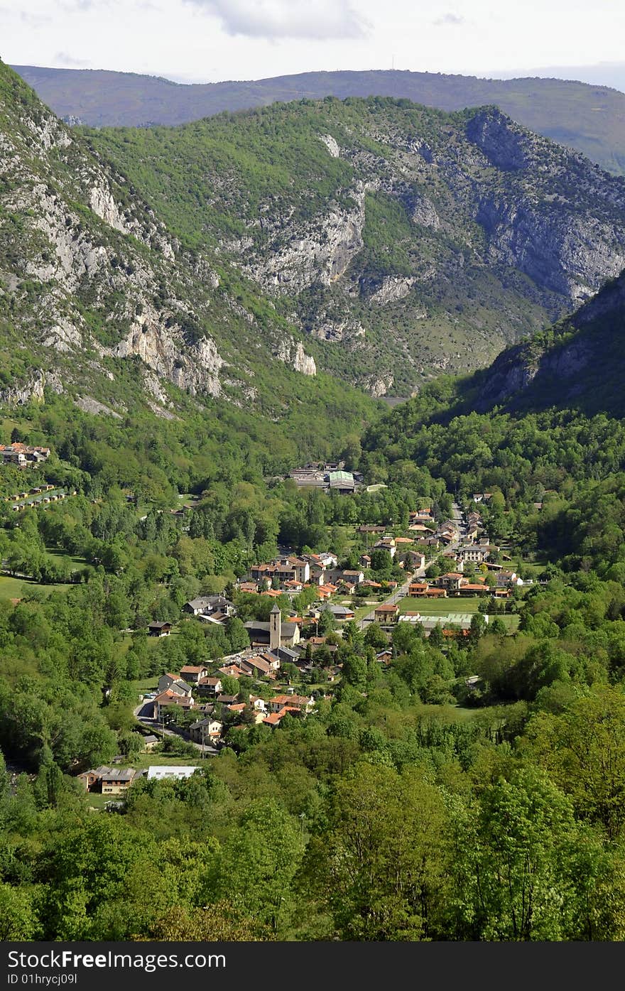 A small village into a Pyrenees valley, France. A small village into a Pyrenees valley, France