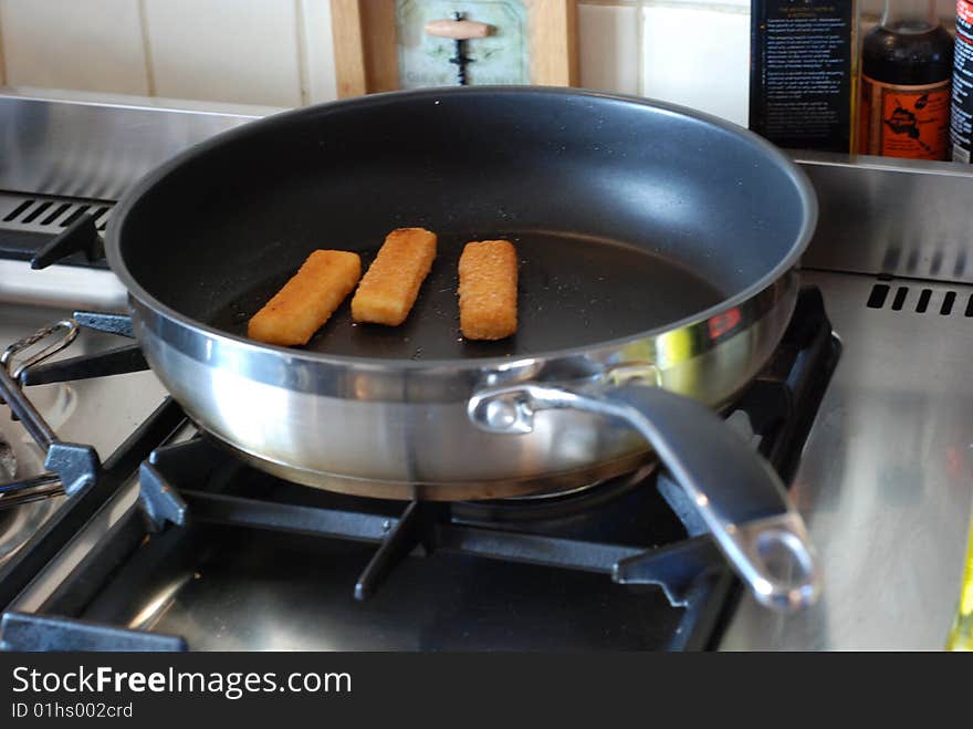 Fish fingers in a pan