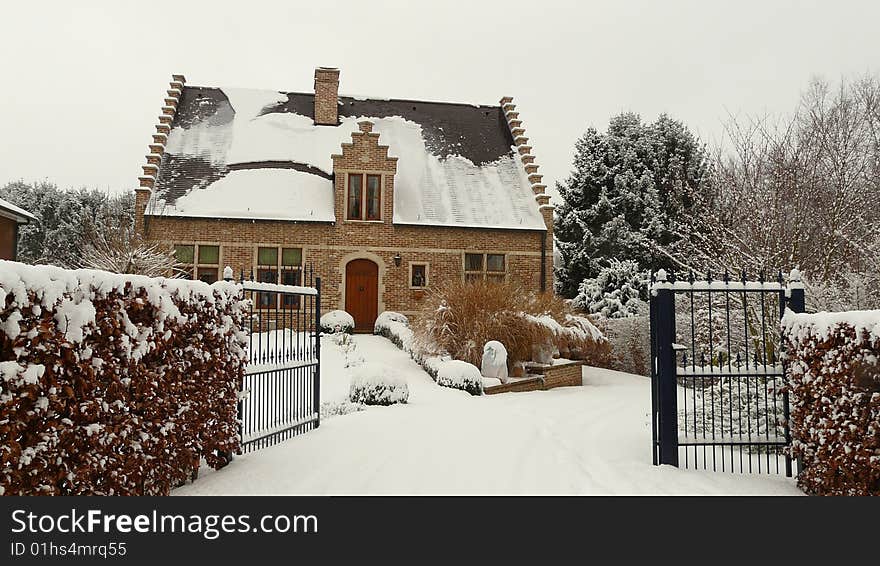 european house exterior in winterlandscape