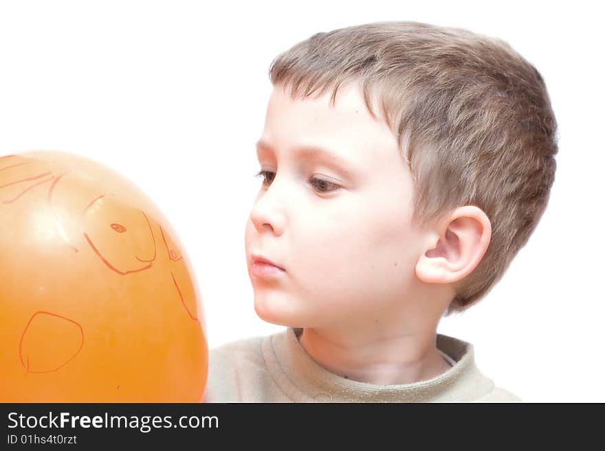 Little boy looking on balloon. Little boy looking on balloon