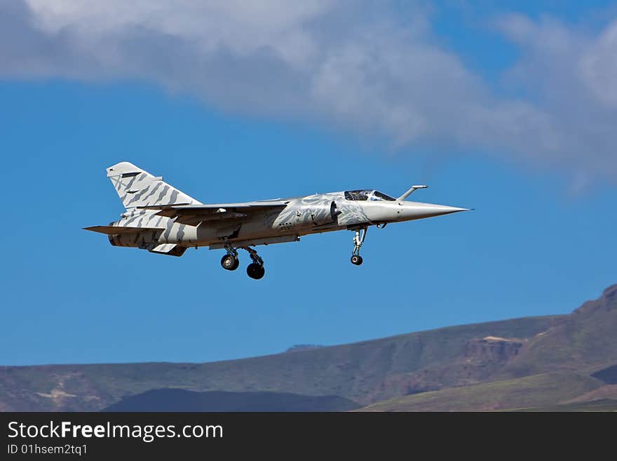 Dassault mirage f1 airplane on blue sky day