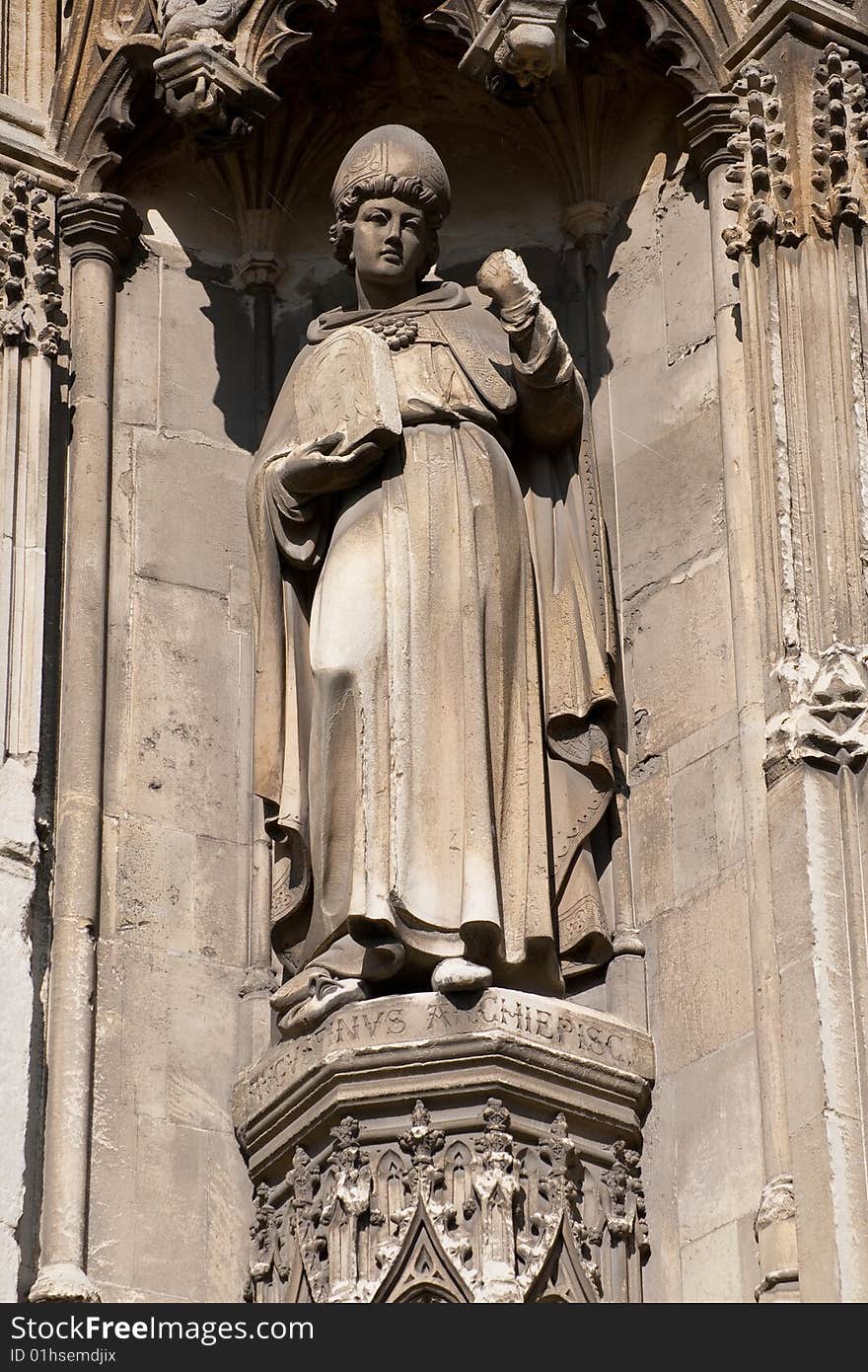 Statue of a bishop made in stone in Canterbury. Statue of a bishop made in stone in Canterbury