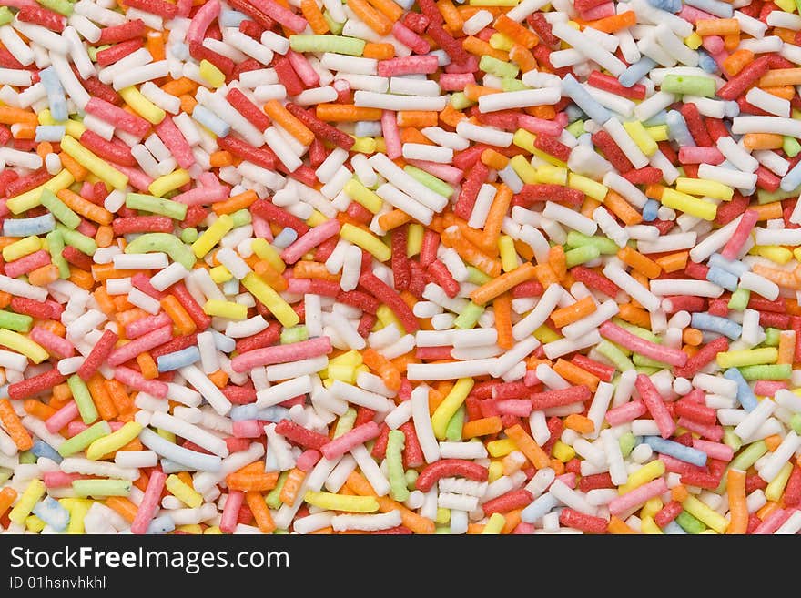 A close-up of a lot of colourful sugar decoration