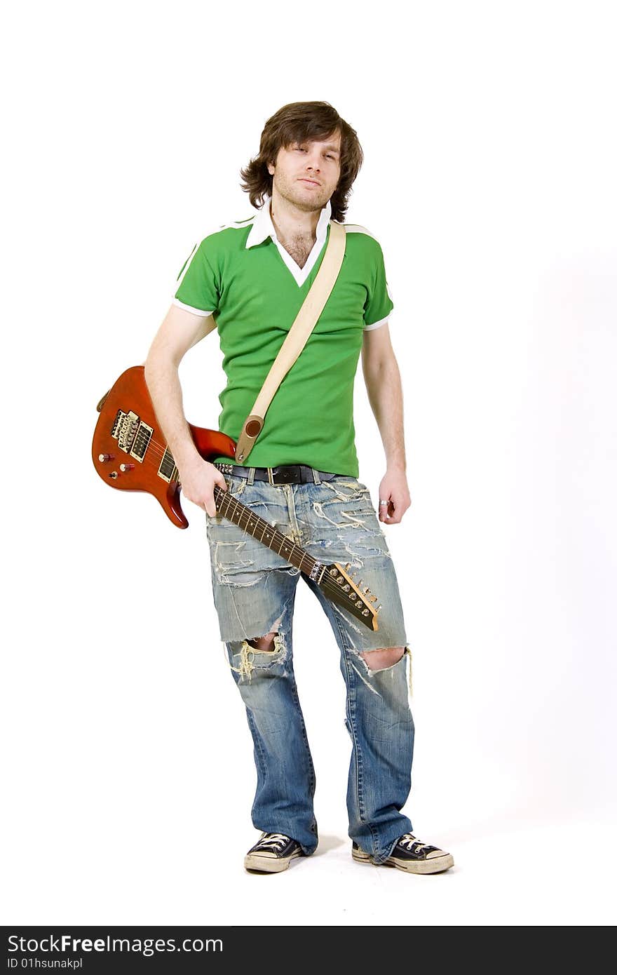 Guitarist with his guitar on shoulder