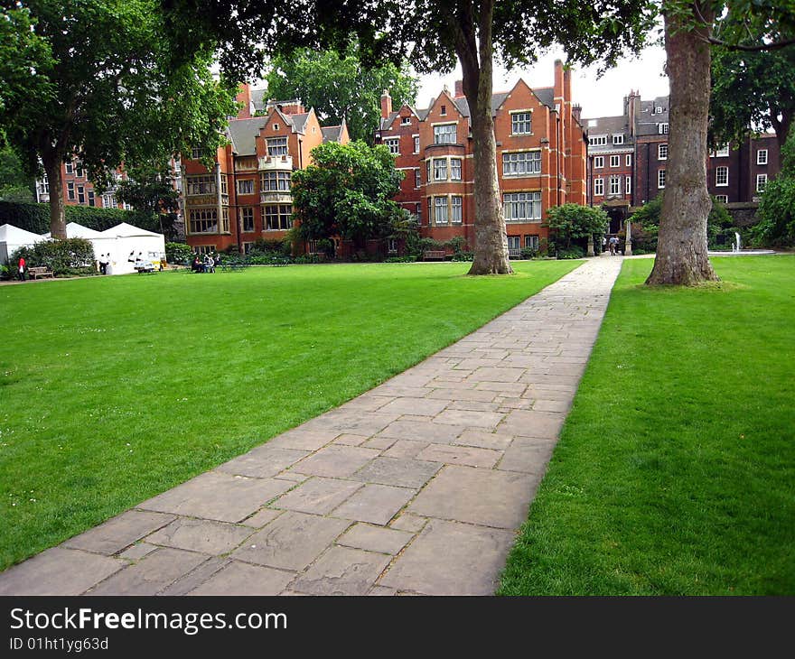 Ornate townhouses in a parklike setting near Parliament. Ornate townhouses in a parklike setting near Parliament.