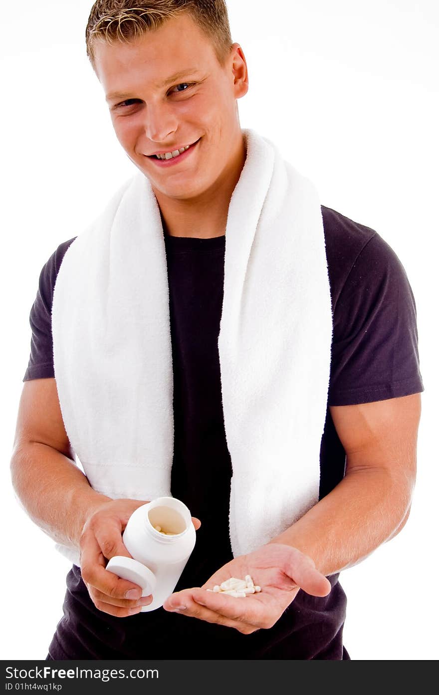 Man showing medicine in his palm on an isolated white background