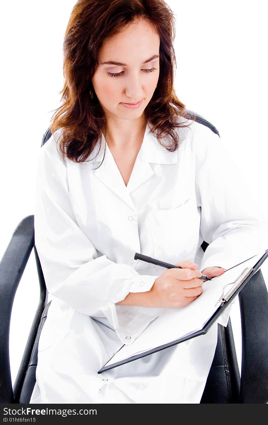 Female surgeon writing prescription