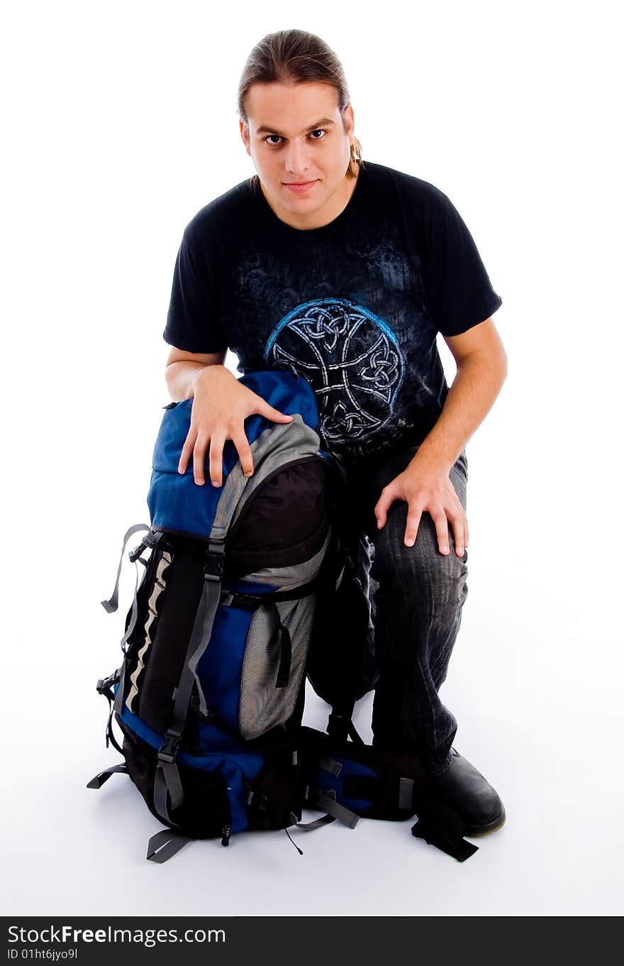 Sitting man on luggage with white background