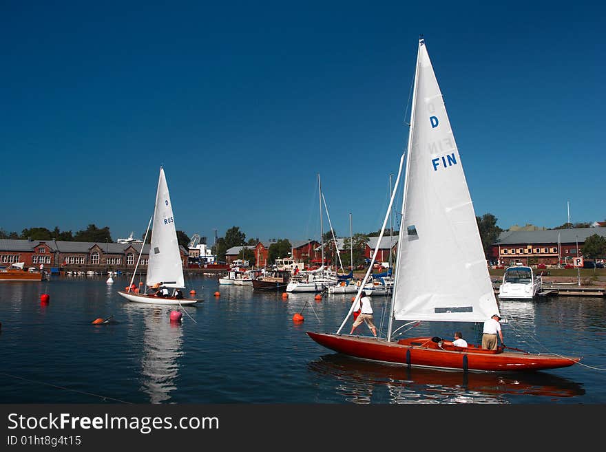 Sport sail yachts class Dracon going to race. Sport sail yachts class Dracon going to race.