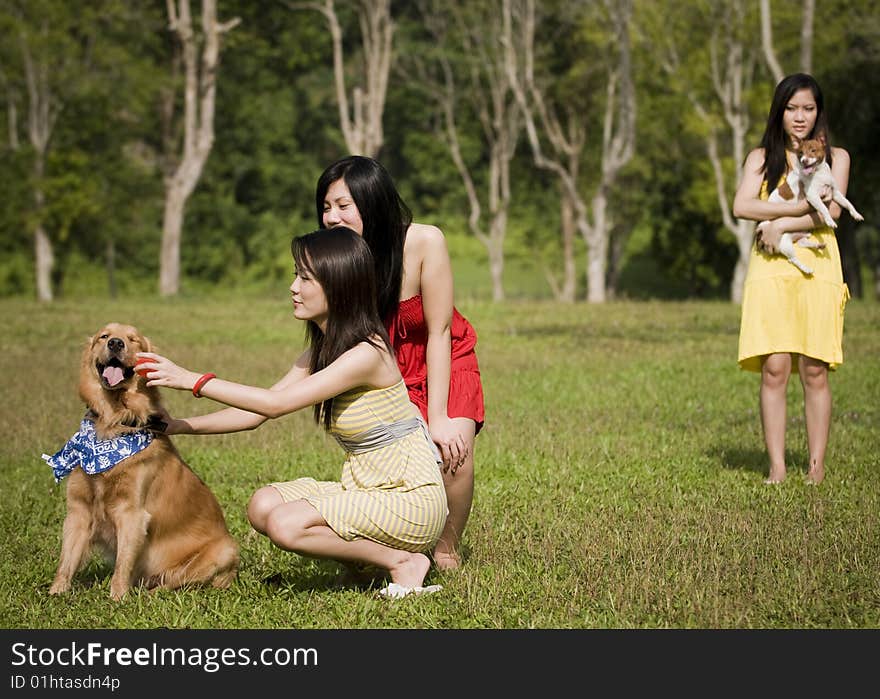 Girlfriends having some happy time together in the park. Girlfriends having some happy time together in the park