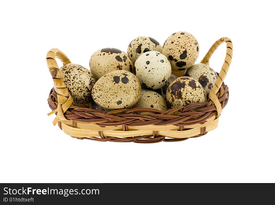 Crude eggs in basket isolated on a white background